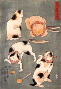 歌川国芳の浮世絵。手ぬぐいをかぶった猫たちが人のような仕草をしている